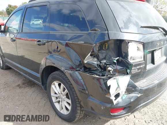 2013 Dodge Journey SXT with VIN 3C4PDDBG7DT553130, listed as a IAAI auction lot 40570369 with Not Provided miles and . Bid and sale history available at DreamBid. Image 6.