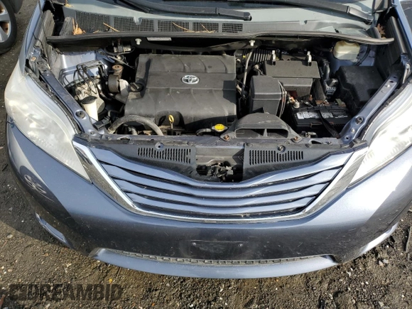2015 Toyota Sienna XLE with VIN 5TDYK3DC4FS643475, listed as a Copart auction lot 52697405 with 153,808 mi miles and Salvage Title. Bid and sale history available at DreamBid. Image 12.