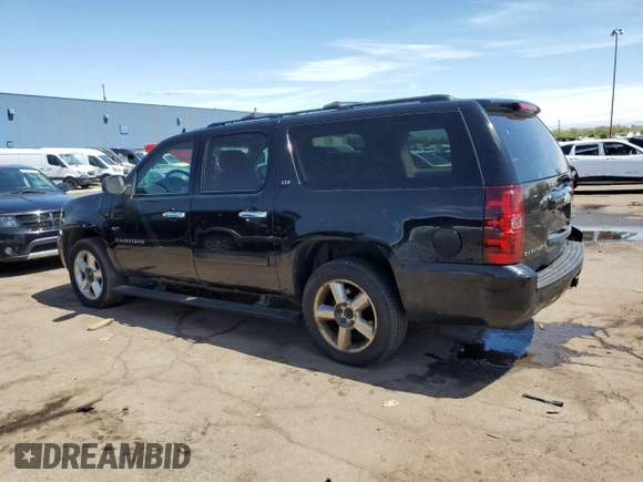 2008 Chevrolet Suburban LTZ z VIN 1GNFK16308R212830, wystawiony jako Copart lot #56477205 z przebiegiem 218 676 mil mil oraz Czysty tytuł • Clean title. Historia ofert i sprzedaży dostępna na DreamBid. Obrazek 2.