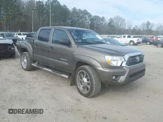 2015 Toyota Tacoma with VIN 5TFLU4ENXFX126170, listed as a IAAI auction lot 41710558 with 225,825 mi miles. Bid and sale history available at carsss.com. Image 1.