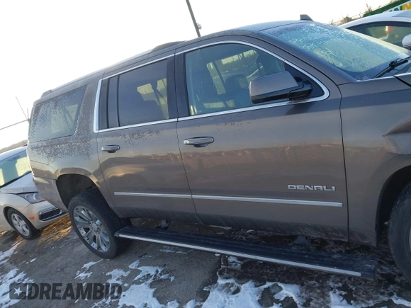 2016 GMC Yukon XL Denali with VIN 1GKS2HKJ8GR432174, listed as a IAAI auction lot 41411844 with 187,258 mi miles and . Bid and sale history available at carsss.com. Image 13.