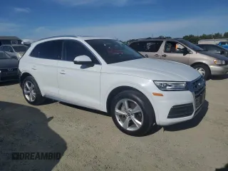 2020 Audi Q5 Premium with VIN WA1ANAFYXL2034037, listed as a Copart auction lot 63627825 with 33,874 mi miles and Salvage title. Bid and sale history available at DreamBid. Image 4.