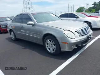 2003 Mercedes-Benz E-Class 3.2L with VIN WDBUF65JX3A341682, listed as a IAAI auction lot 42107536 with 1 mi miles. Bid and sale history available at carsss.com. Image 1.