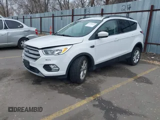 2018 Ford Escape SE z VIN 1FMCU9GD0JUC62783, wystawiony jako IAAI lot #41488153 z przebiegiem 55 774 mil mil oraz . Historia ofert i sprzedaży dostępna na DreamBid. Obrazek 17.
