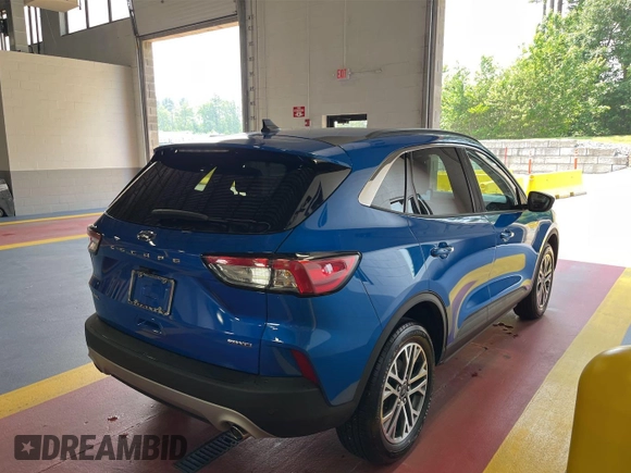 2021 Ford Escape SEL with VIN 1FMCU9H99MUA91420, listed as a IAAI auction lot 42569696 with 10,319 mi miles and . Bid and sale history available at DreamBid. Image 10.