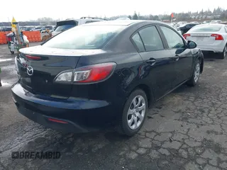 2011 Mazda Mazda3 i Sport with VIN JM1BL1UG5B1459907, listed as a IAAI auction lot 41724612 with 154,008 mi miles. Bid and sale history available at carsss.com. Image 4.