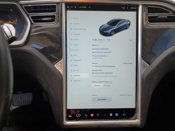 2013 Tesla Model S with VIN 5YJSA1CG9DFP09733, listed as a Copart auction lot 71574474 with 88,163 mi miles and Salvage title. Bid and sale history available at DreamBid. Image 9.