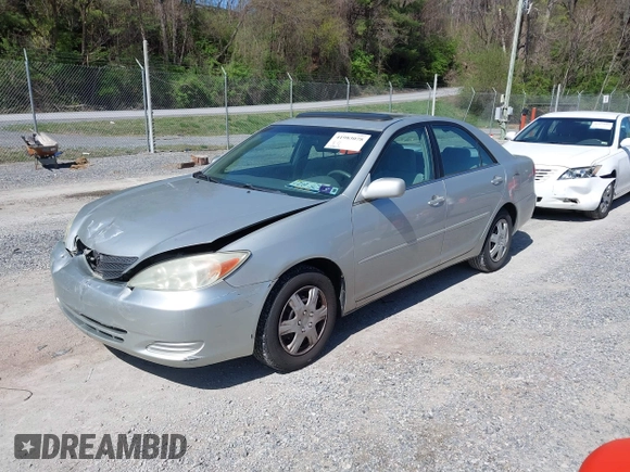 2004 Toyota Camry LE with VIN 4T1BE30K14U290983, listed as a IAAI auction lot 41983078 with 174,852 mi miles and . Bid and sale history available at carsss.com. Image 19.