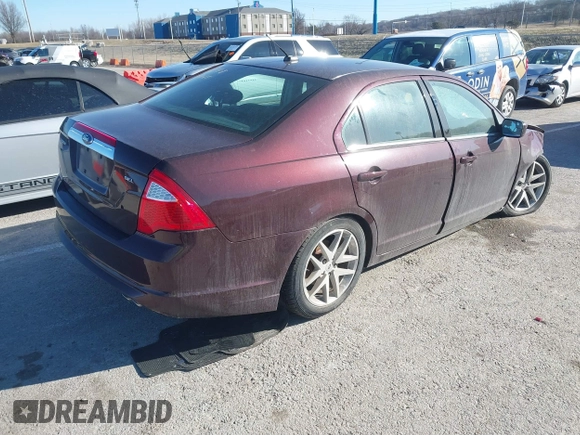 2012 Ford Fusion SEL z VIN 3FAHP0JA7CR302871, wystawiony jako IAAI lot #41694603 z przebiegiem 104 104 mil mil oraz . Historia ofert i sprzedaży dostępna na DreamBid. Obrazek 4.