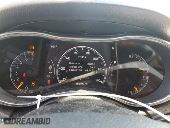 2014 Jeep Grand Cherokee Laredo with VIN 1C4RJEAG7EC274573, listed as a Copart auction lot 52637255 with 156,409 mi miles and Salvage Title. Bid and sale history available at DreamBid. Image 9.