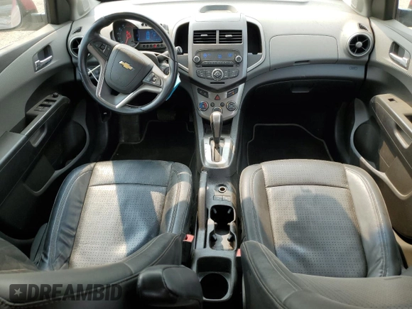 2012 Chevrolet Sonic LTZ with VIN 1G1JE6SH7C4111176, listed as a Copart auction lot 59002575 with 116,640 mi miles and Salvage title. Bid and sale history available at DreamBid. Image 8.