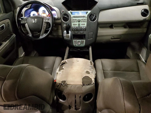 2009 Honda Pilot Touring z VIN 5FNYF48899B054320, wystawiony jako Copart lot #58948585 z przebiegiem 254 997 mil mil oraz Szkoda całkowita • Salvage title. Historia ofert i sprzedaży dostępna na DreamBid. Obrazek 8.