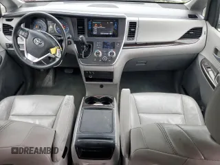 2015 Toyota Sienna XLE with VIN 5TDYK3DC4FS659692, listed as a Copart auction lot 57248355 with 121,644 mi miles and Salvage title. Bid and sale history available at DreamBid. Image 8.