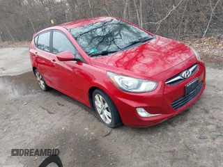 2012 Hyundai Accent SE with VIN KMHCU5AE8CU018361, listed as a IAAI auction lot 42050938 with 133,688 mi miles. Bid and sale history available at carsss.com. Image 1.