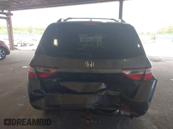 2012 Honda Odyssey EX-L with VIN 5FNRL5H67CB016934, listed as a IAAI auction lot 42405714 with 248,512 mi miles and . Bid and sale history available at DreamBid. Image 16.