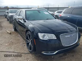2015 Chrysler 300 300C with VIN 2C3CCAEG8FH908477, listed as a IAAI auction lot 41702256 with 140,017 mi miles. Bid and sale history available at carsss.com. Image 1.