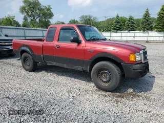 2005 Ford Ranger XLT with VIN 1FTZR45E45PA22946, listed as a Copart auction lot 59888615 with 148,856 mi miles and Salvage title. Bid and sale history available at DreamBid. Image 4.