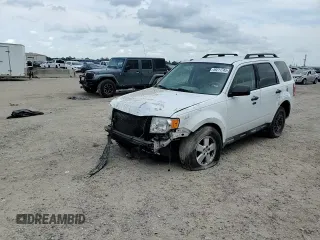 2011 Ford Escape XLT z VIN 1FMCU9D77BKB26159, wystawiony jako Copart lot #59211745 z przebiegiem 252 374 mil mil oraz Szkoda całkowita • Salvage title. Historia ofert i sprzedaży dostępna na DreamBid. Obrazek 14.