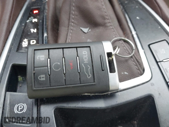 2013 Cadillac SRX Performance Collection with VIN 3GYFNHE34DS628486, listed as a IAAI auction lot 42530124 with 76,778 mi miles and . Bid and sale history available at DreamBid. Image 11.