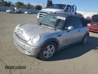 2005 MINI Convertible with VIN WMWRF33465TG10044, listed as a Copart auction lot 50364235 with 152,186 mi miles and Salvage title. Bid and sale history available at DreamBid. Image 1.