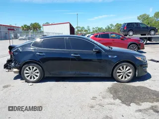 2017 Kia Optima EX with VIN 5XXGU4L35HG142807, listed as a IAAI auction lot 41856251 with 104,634 mi miles and . Bid and sale history available at carsss.com. Image 13.