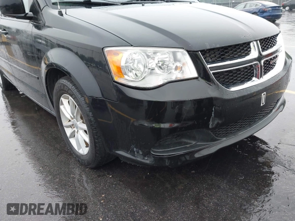 2015 Dodge Grand Caravan SXT with VIN 2C4RDGCG8FR556861, listed as a IAAI auction lot 42224948 with 110,797 mi miles and . Bid and sale history available at DreamBid. Image 6.