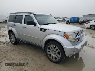 2011 Dodge Nitro Heat with VIN 1D4PU4GXXBW585461, listed as a Copart auction lot 85256984 with 145,585 mi miles and Salvage Title. Bid and sale history available at carsss.com. Image 4.