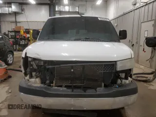 2014 Chevrolet Express Passenger LT with VIN 1GAZG1FG4E1176590, listed as a Copart auction lot 83660024 with 167,653 mi miles and Salvage title. Bid and sale history available at DreamBid. Image 5.