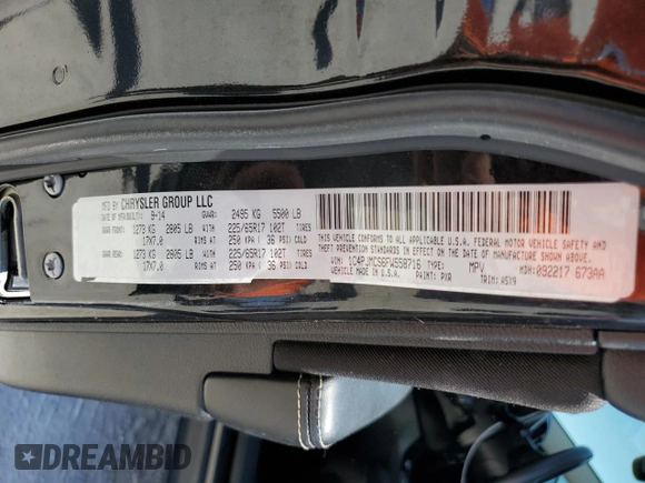 2015 Jeep Cherokee Latitude with VIN 1C4PJMCS6FW558716, listed as a Copart auction lot 50702375 with 133,088 mi miles and Salvage Title. Bid and sale history available at DreamBid. Image 15.