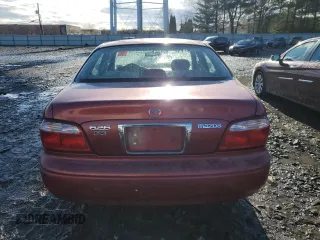2000 Mazda 626 LX with VIN 1YVGF22CXY5172092, listed as a Copart auction lot 81960694 with 214,185 mi miles and Salvage Title. Bid and sale history available at carsss.com. Image 6.
