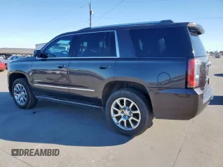 2015 GMC Yukon Denali with VIN 1GKS1CKJ7FR132677, listed as a Copart auction lot 47820925 with 144,821 mi miles and Salvage Title. Bid and sale history available at carsss.com. Image 2.