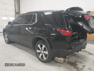 2022 Chevrolet Traverse LT with VIN 1GNEVHKW3NJ124361, listed as a IAAI auction lot 41033053 with 27,869 mi miles and . Bid and sale history available at DreamBid. Image 3.