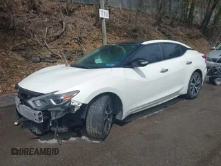 2017 Nissan Maxima SV z VIN 1N4AA6AP3HC434557, wystawiony jako IAAI lot #42203547 z przebiegiem 121 518 mil mil oraz . Historia ofert i sprzedaży dostępna na DreamBid. Obrazek 2.