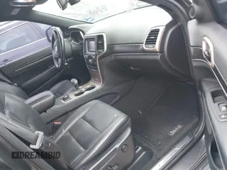 2014 Jeep Grand Cherokee Limited with VIN 1C4RJFBG4EC227165, listed as a IAAI auction lot 42135232 with 105,873 mi miles. Bid and sale history available at carsss.com. Image 5.