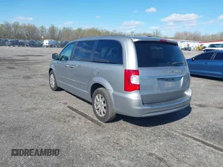 2016 Chrysler Town & Country Touring with VIN 2C4RC1BG5GR175293, listed as a IAAI auction lot 41985609 with 154,638 mi miles. Bid and sale history available at carsss.com. Image 3.