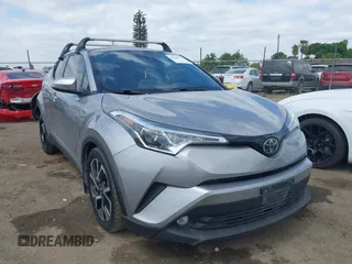 2019 Toyota C-HR XLE with VIN JTNKHMBX3K1016723, listed as a IAAI auction lot 42040571 with 158,804 mi miles. Bid and sale history available at carsss.com. Image 1.
