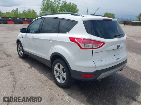 2014 Ford Escape SE with VIN 1FMCU9GX6EUD51032, listed as a IAAI auction lot 42206659 with 131,438 mi miles and . Bid and sale history available at DreamBid. Image 3.