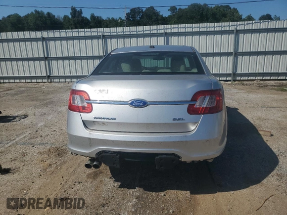 2011 Ford Taurus SEL z VIN 1FAHP2EW2BG176510, wystawiony jako Copart lot #51081085 z przebiegiem 261 031 mil mil oraz Szkoda całkowita • Salvage title. Historia ofert i sprzedaży dostępna na DreamBid. Obrazek 6.