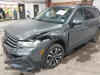 2022 Volkswagen Tiguan S z VIN 3VV0B7AX2NM042934, wystawiony jako IAAI lot #42172199 z przebiegiem 71 367 mil mil oraz . Historia ofert i sprzedaży dostępna na DreamBid. Obrazek 6.