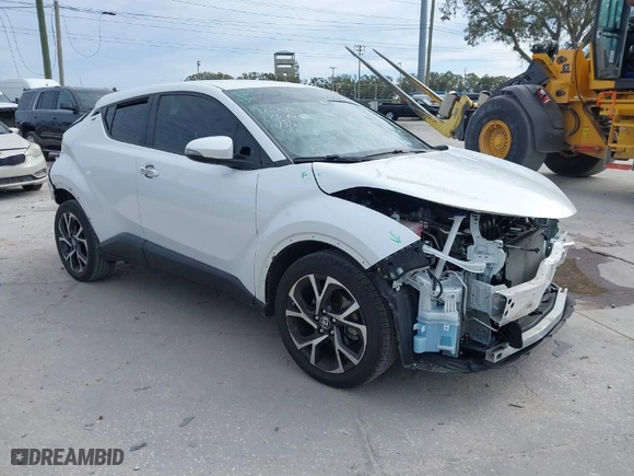 2022 Toyota C-HR XLE with VIN NMTKHMBX4NR147265, listed as a IAAI auction lot 41291034 with 22,403 mi miles. Bid and sale history available at carsss.com. Image 1.