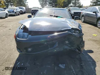 1995 Mitsubishi 3000GT z VIN JA3AM54J6SY013766, wystawiony jako Copart lot #75465424 z przebiegiem 103 869 mil mil oraz Szkoda całkowita • Salvage title. Historia ofert i sprzedaży dostępna na DreamBid. Obrazek 5.