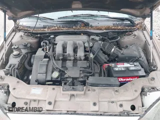 1996 Mercury Sable LS z VIN 1MELM53S1TG638988, wystawiony jako IAAI lot #42523616 z przebiegiem 87 087 mil mil oraz . Historia ofert i sprzedaży dostępna na DreamBid. Obrazek 10.