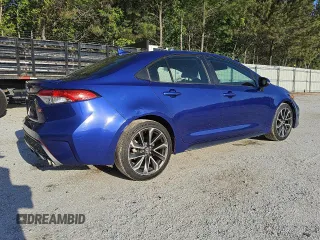 2020 Toyota Corolla SE with VIN 5YFS4RCE2LP047243, listed as a Copart auction lot 52650135 with 136,542 mi miles and Clean Title. Bid and sale history available at DreamBid. Image 3.