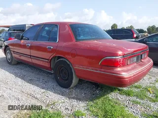 1997 Mercury Grand Marquis GS z VIN 2MELM74W4VX723365, wystawiony jako IAAI lot #42418646 z przebiegiem 197 362 mil mil oraz . Historia ofert i sprzedaży dostępna na DreamBid. Obrazek 3.