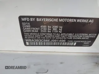 2014 BMW 3 Series 328i xDrive with VIN WBA3B3C56EJ981496, listed as a IAAI auction lot 41822862 with 137,700 mi miles. Bid and sale history available at carsss.com. Image 9.