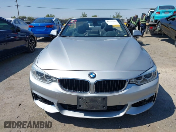 2014 BMW 4 Series 435i with VIN WBA3T3C54EJ877196, listed as a IAAI auction lot 42755387 with 113,172 mi miles and . Bid and sale history available at DreamBid. Image 13.