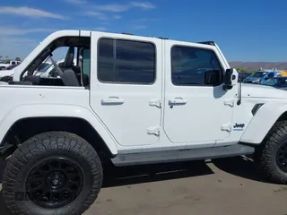 2021 Jeep Wrangler Unlimited Sahara with VIN 1C4JJXP63MW716690, listed as a IAAI auction lot 42087879 with 40,889 mi miles and . Bid and sale history available at DreamBid. Image 13.