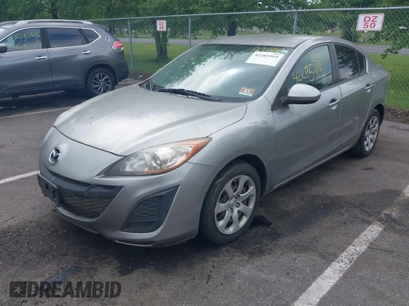 2011 Mazda 3 i Sport with VIN JM1BL1UG7B1459259, listed as a IAAI auction lot 42285919 with 121,539 mi miles and . Bid and sale history available at DreamBid. Image 2.