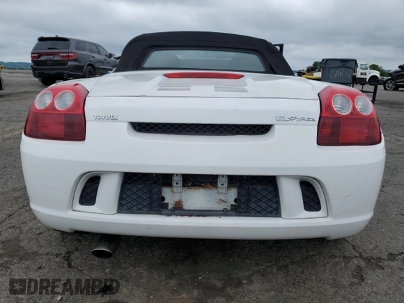 2003 Toyota MR2 z VIN JTDFR320130054491, wystawiony jako Copart lot #58899155 z przebiegiem 62 552 mil mil oraz Szkoda całkowita • Salvage title. Historia ofert i sprzedaży dostępna na DreamBid. Obrazek 6.