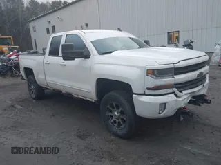 2016 Chevrolet Silverado 1500 LT with VIN 1GCVKREC2GZ103529, listed as a IAAI auction lot 41114085 with 140,841 mi miles. Bid and sale history available at carsss.com. Image 1.